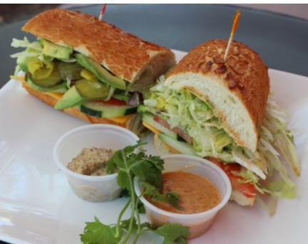 10. Veggie Sandwich · Avocado and cucumber. Cajun mayo, Yellow mustard, lettuce, tomato, red onion, and pickles. Vegetarian.