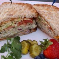 11. Tuna Sandwich · Cajun mayo, Yellow mustard, lettuce, tomato, red onion, and pickles.