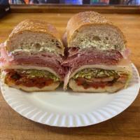 THE COLOSSUS - THE ULTIMATE ITALIAN HOAGIE · A half pound of meat consisting of peppered ham, capicola, genoa salami, pepperoni, prosciut...