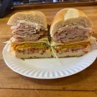 THE GALACTICON - THE ULTIMATE SPICY TURKEY TRIO SANDWICH · A half pound of meat consisting of cracked pepper turkey, santa fe turkey, and smoked turkey...