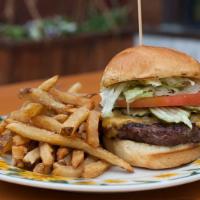 Burger · Tillamook cheddar, lettuce, tomato, pickles, brioche bun. Add-ons for an additional charge.