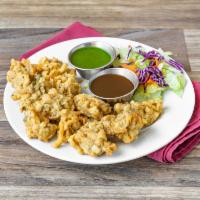 Vegetable Pakoras · Mixed vegetable fritters.