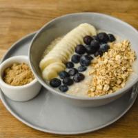 Oatmeal · Rolled oats topped with bananas, blueberries, strawberries, granola, and
 a side of brown su...