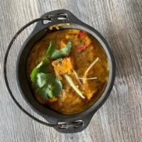 Kadai Paneer · Paneer cooked in Onion, Ginger and Tomato paste, red & green Peppers & spices.