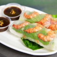 A1. Spring Rolls · 2 pieces. Clear rice wraps with shrimp, lettuce, cucumber, carrot, bean sprouts and rice noo...