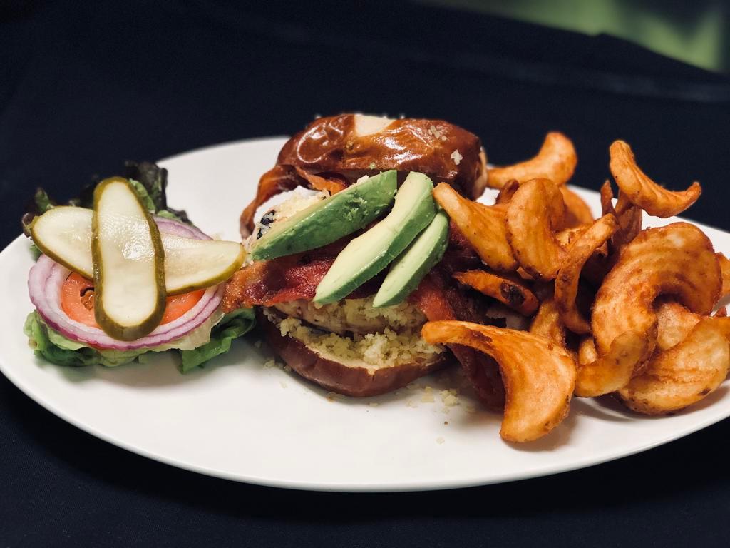 Chicken Bacon Avocado · Grilled chicken, bacon, avocado-lime aioli, aged white cheddar served on a pretzel bun with, lettuce, tomato, and onion