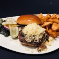 Torrey Pines Burger · Your choice of protein, topped with cremini mushrooms with truffle oil, and aged white chedd...