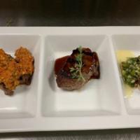 Prime Steak Trio · A trio of steaks: beef, bison and Wagyu Beef, each with a unique preparation (bison with pec...