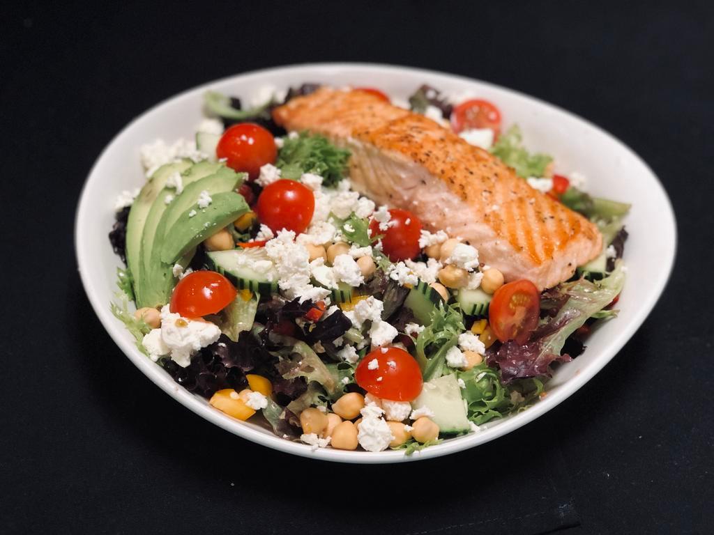 Range Power Salad · Red and yellow bell peppers, cherry tomatoes, avocados, cucumbers, green onions, chickpeas, and feta laid over a bed of mixed greens tossed in a basil vinaigrette. Gluten free.
