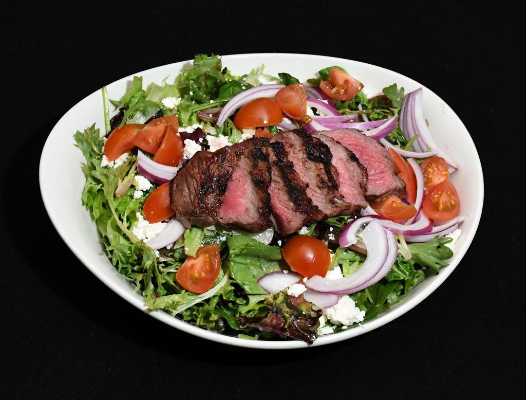 New York Steak Salad · Prime New York strip, onions, and cherry tomatoes served over mixed greens, tossed with Range vinaigrette and topped with feta