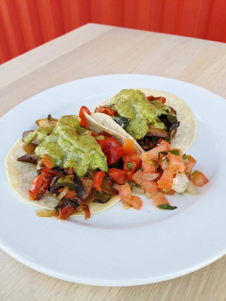 Veggie Tacos · Portobello mushroom, poblano and red peppers, sweet onion. Served a la carte, 2 tacos per order.