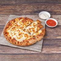 Cheesebread · Our famous pizza crust baked with garlic butter and cheese. Served with marinara and Chanell...