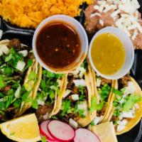 5 Tacos Platter · 5 Tacos, Rice and Bean, Cilantro, Onion, Radishes and Salsa.