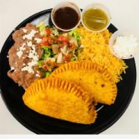 Empanadas Platter · 2 Crispy fried dough  filled with your choice of meat and cheese.