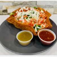 Taco Salad · Choice of meat, lettuce, beans, pico de gallo, cheese and sour cream.