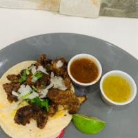 Taco Tripas · Tripas, cilantro,onion,salsa 