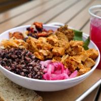 Spicy Chicken Warm Rice Bowl · Purple rice, spicy Thai chicken, roasted vegetables, falafel, spinach, pickled red onions, s...