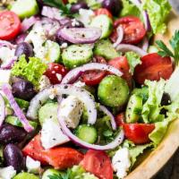 Mediterranean Gyro Salad · Lettuce, tomatoes, cucumbers topped with Kalamata olives and feta cheese tossed in our Greek...