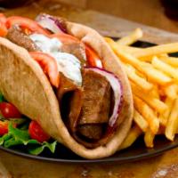 Gyro Sandwich · Shaved roast lamb and beef with lettuce tomato onion and homemade Tzotzil sauce. Served in p...