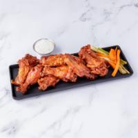 Buffalo Wings · Served with celery, carrots and blue cheese with hot or mild sauce.