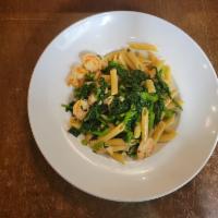 Penne with Broccoli Rabe and Shrimp · In garlic and oil.