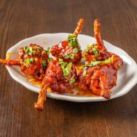 15. Chicken Lollipop · Chicken wings marinated with fresh, aromatic ginger, garlic and green chillies, batter fried.