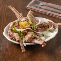 25. Rack of Lamb · Tender lamb chops marinated with fresh ginger, garlic and our chef's blend of savory spices....