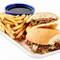 Philly Cheesesteak · Thinly sliced Steak grilled with Roasted Bell Peppers and Onions. Topped with Provolone chee...