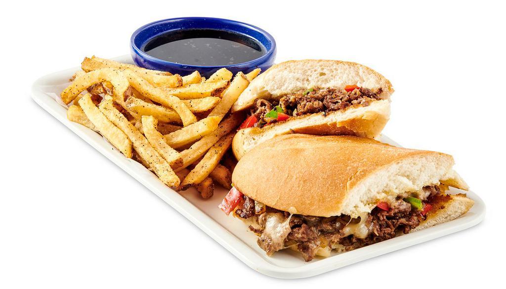 Philly Cheesesteak · Thinly sliced Steak grilled with Roasted Bell Peppers and Onions. Topped with Provolone cheese. Served with a side of Au Jus Gravy and fresh-cut fries.