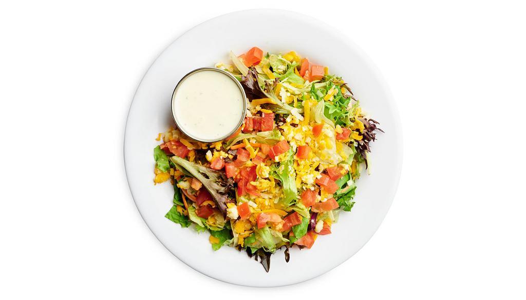 Side Salad · Mixed greens, diced tomatoes, jack, and cheddar cheese.