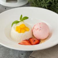 Coconut Panna Cotta · Can be gluten free.  Please specify when placing order
Served with one scoop of strawberry i...