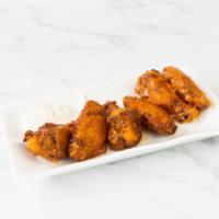 House Buffalo Wings · Cooked wing of a chicken coated in sauce or seasoning.
