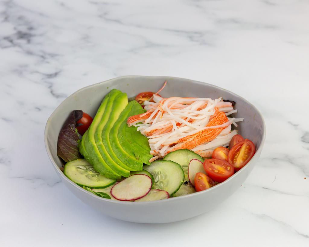 Crabmeat Salad · Crabmeat sticks, avocado, grape tomatoes, radishes, cucumbers and Ginger Dressing