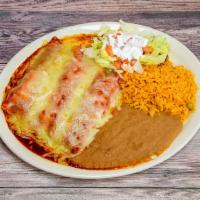 Enchiladas Rojas · 3 beef, chicken or cheese enchiladas covered with red guajillo sauce.