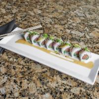 Midnight Rambler Roll · Spicy tuna, cucumber, cilantro, yellowtail, mango, scallions, and yuzu miso glaze.