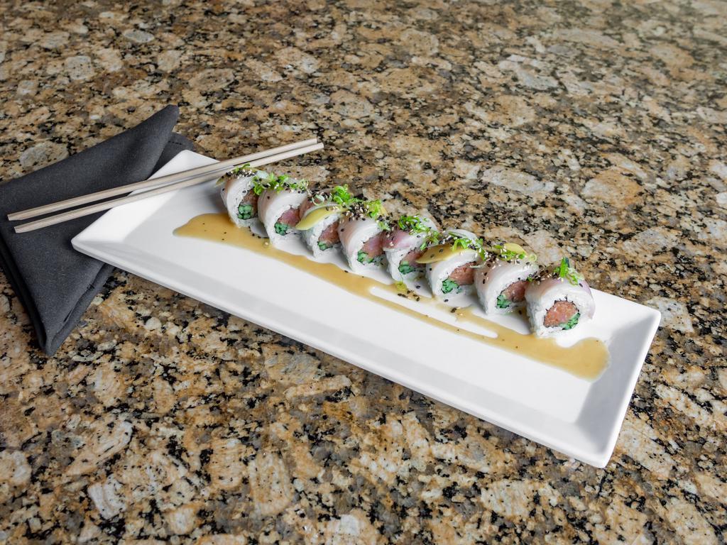 Midnight Rambler Roll · Spicy tuna, cucumber, cilantro, yellowtail, mango, scallions, and yuzu miso glaze.