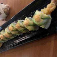 Shrimp Tempura Roll · Shrimp tempura with cucumber roll topped with avocado and spicy mayo and eel sauce.