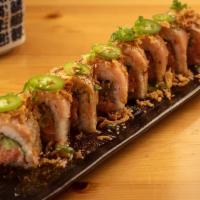 Albacore on Fire Roll · Albacore and cucumber cut roll topped with albacore, crispy onion, jalapeno and homemade spi...