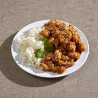 CK13. Sesame Chicken · Freshly breaded chicken, fried to a golden crisp and sauteed in a sweet brown sauce. Topped ...