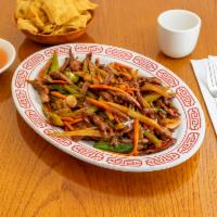 Szechuan Beef · Served with celery, carrots, dried chili peppers. Hot and spicy.