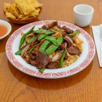 Mongolian Beef · Chinese BBQ garlic sauce sauteed with onions and snow peas served with angel hair. Hot and s...