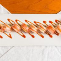 Asian Delite Roll · In: crispy shrimp, avocado, spicy mayo. Top: shredded kani with eel sauce.
