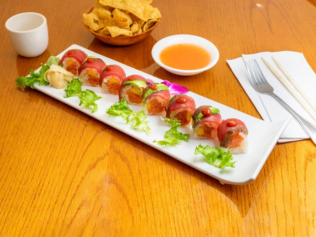 Dynamite Roll · In: spicy tuna, mango, soy paper wrap. Top: pepper tuna and avocado; spicy chili sauce.