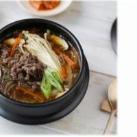 Bulgogi 뚝불고기 · Bulgogi is prepared with beef that
has been marinated in soy sauce, honey,
minced green onio...