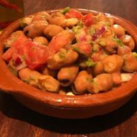 Fava · Fava beans, tomato, red onion, cilantro, serrano, lemon and tahini. Gluten free and vegan.
