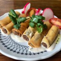 Beef Cigars · Homemade filled with Ground Beef served with tahini