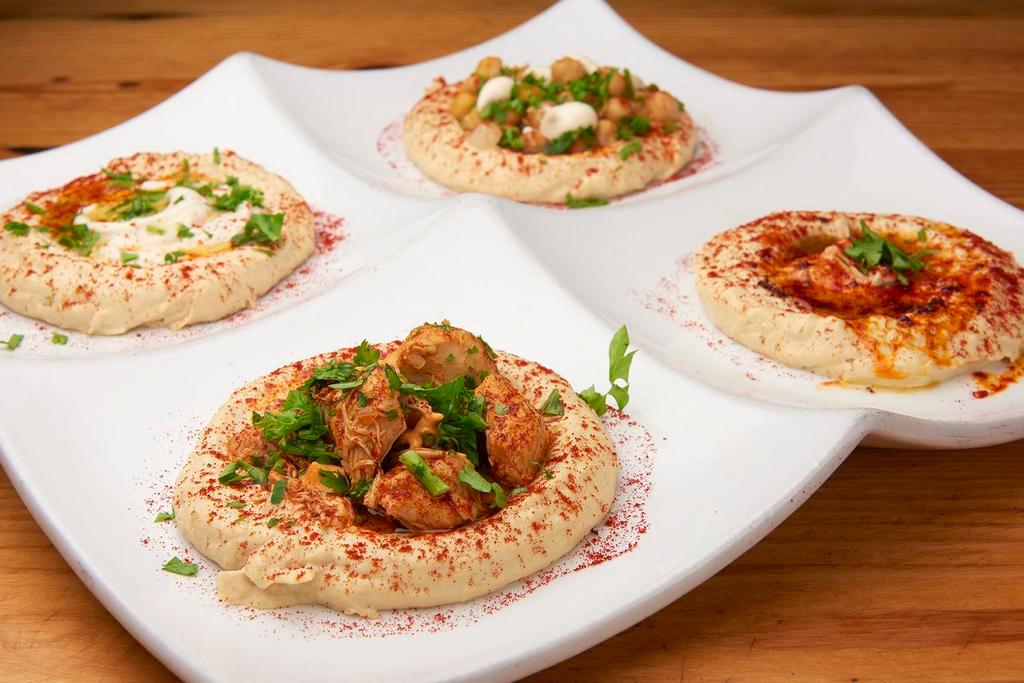The Hummus Kitchen · Sirloin, chicken, chickpeas & tahini. Topped with parsley, paprika, and extra virgin olive oil. Gluten free.
Vegetarian option- mushroom, fava, chickpeas & tahini