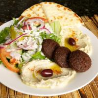 Falafel Plate · A combination of hummus and eggplant dips with 3 pieces falafel. Served with pita, Greek sal...