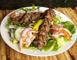 The Kabob Salad · Choice of marinated sirloin or chicken skewered and charbroiled. Served with VK dressing.
