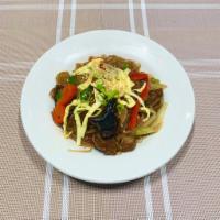 Japchae ·  Stir-fried glass noodles with beef and vegetables.